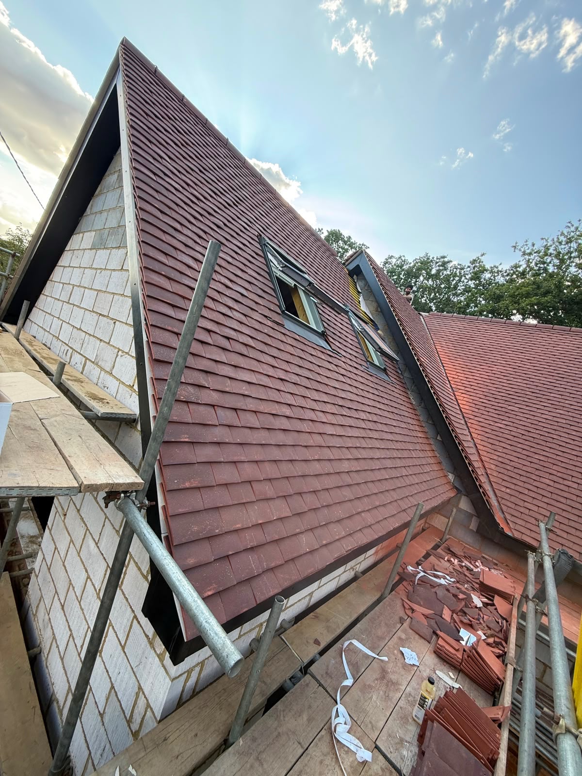 Tiled roof and roof windows from a Culmvalley Roofing project